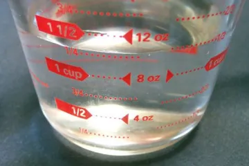 Measuring jug, measuring pitcher.