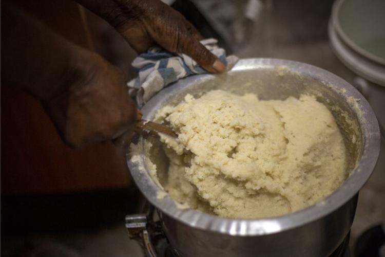 Cooking ugali.