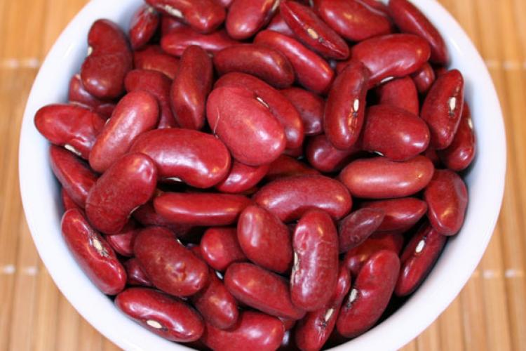REd kidney beans in a white container.