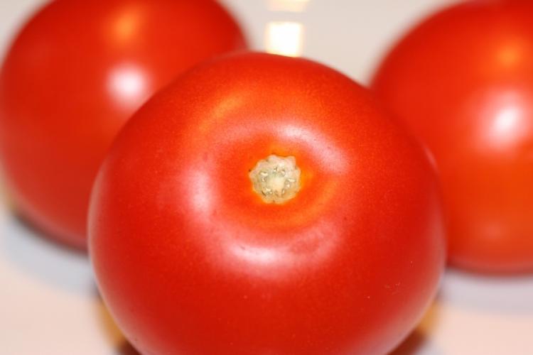 Three fresh tomatoes.