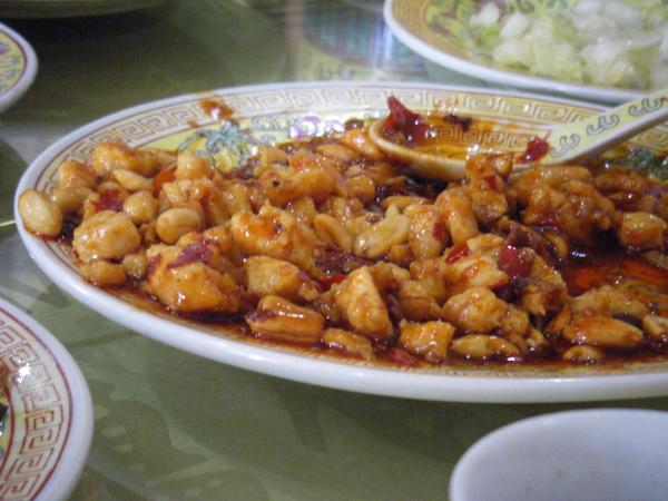 A plate of Chinese food on the table.
