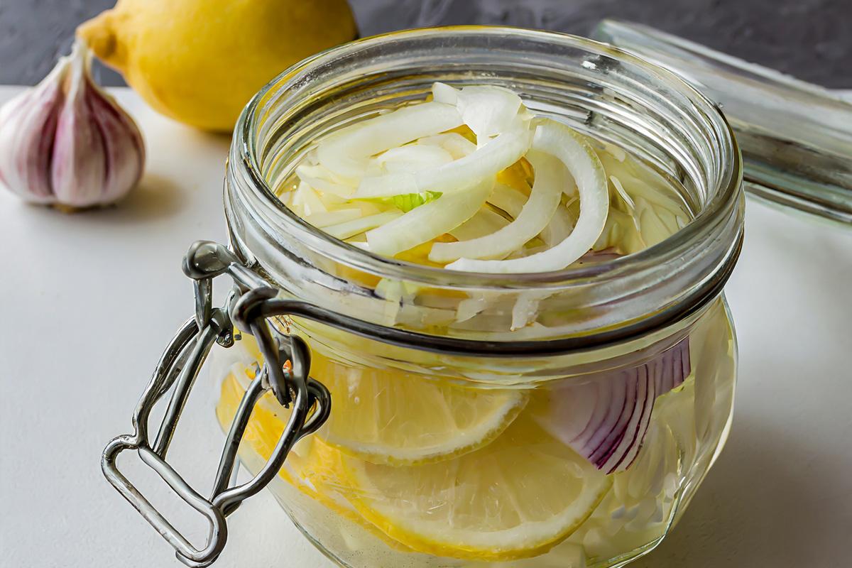 A jar with lemon ketchup ready to refrigerate.