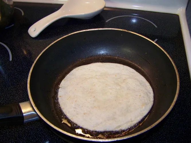 Cooking Meexican tortilla.