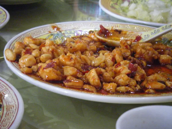 A plate of Chinese food on the table.