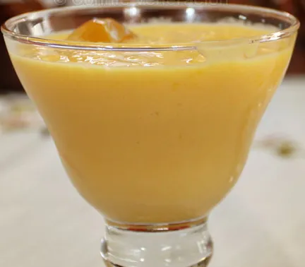 mango lassi in a cup.