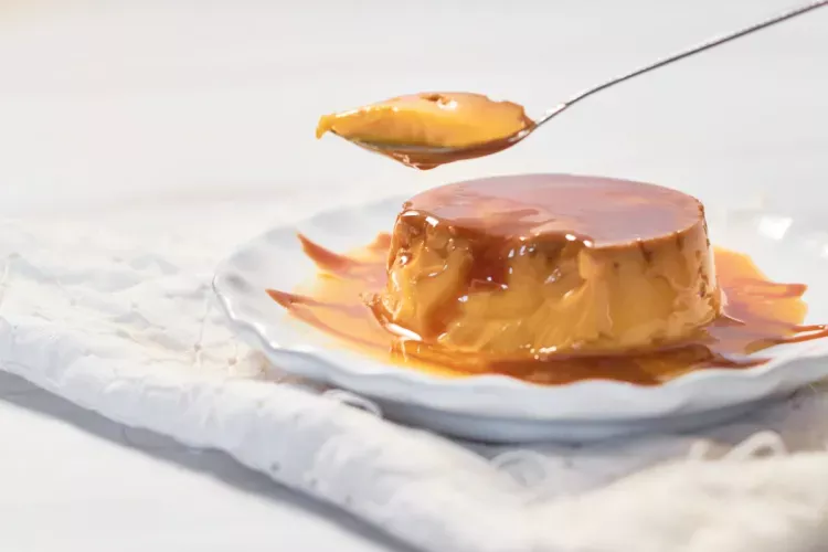 Detail of an individual flan on a plate.
