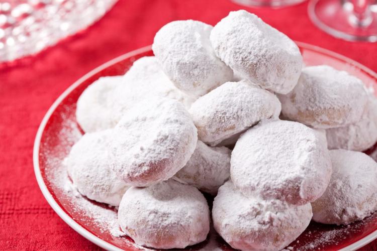 Kourabiedes, Greek Holiday cookies, on a plate.