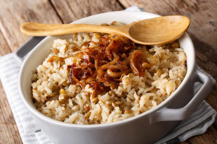 Mujaddara with caramelised onions in a bowl.