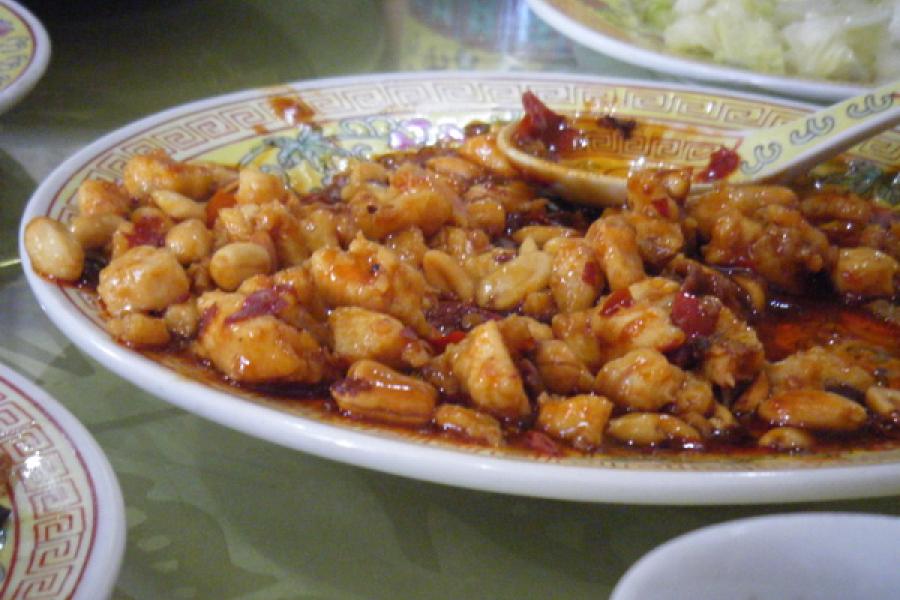 A plate of Chinese food on the table.