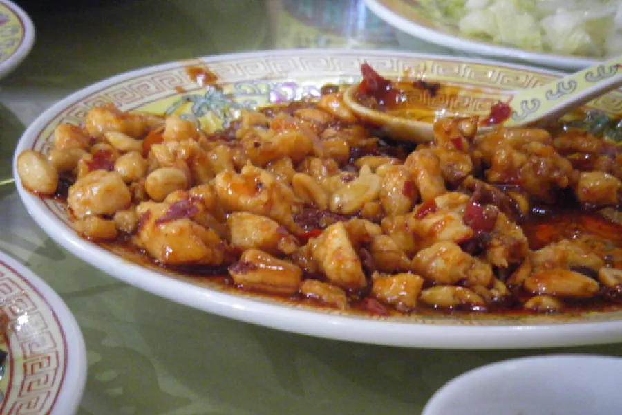 A plate of Chinese food on the table.