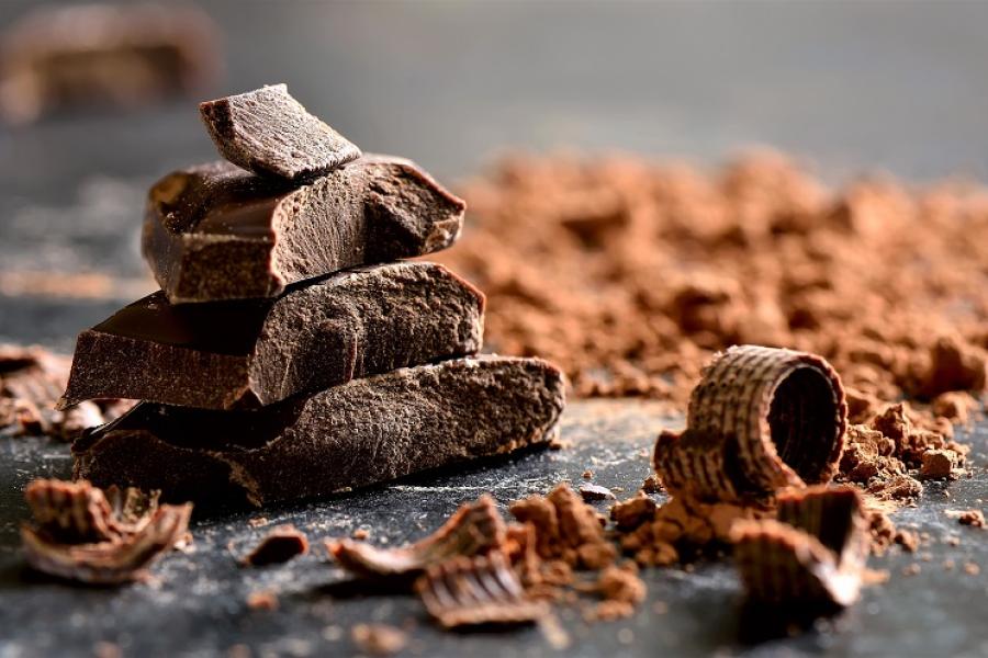 Dark chocolate slivers and chocolate powder.
