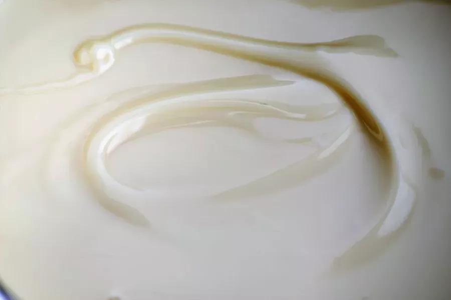 Detail of melted white chocolate.