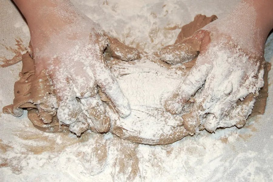 Kneading gingerbread dough.