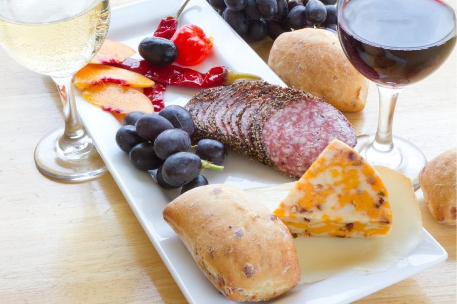 White and red wine with a selection of food.