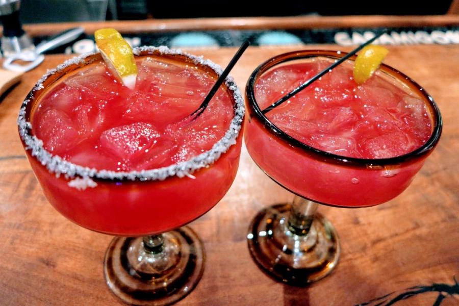 Two glasses with prickly pear margaritas.