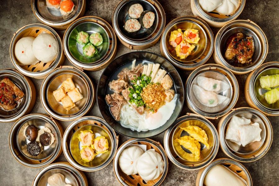 Several types of dim sum on display on a table.