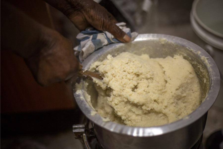 Cooking ugali.