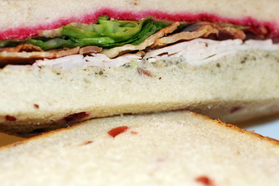 Turkey sandwich made with cranberry bread.