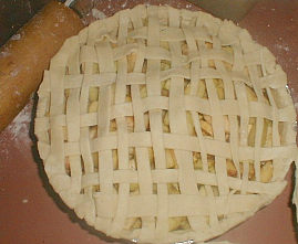 Apple pie ready for the oven, image.